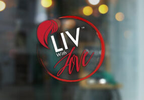 Liv With Love logo on window