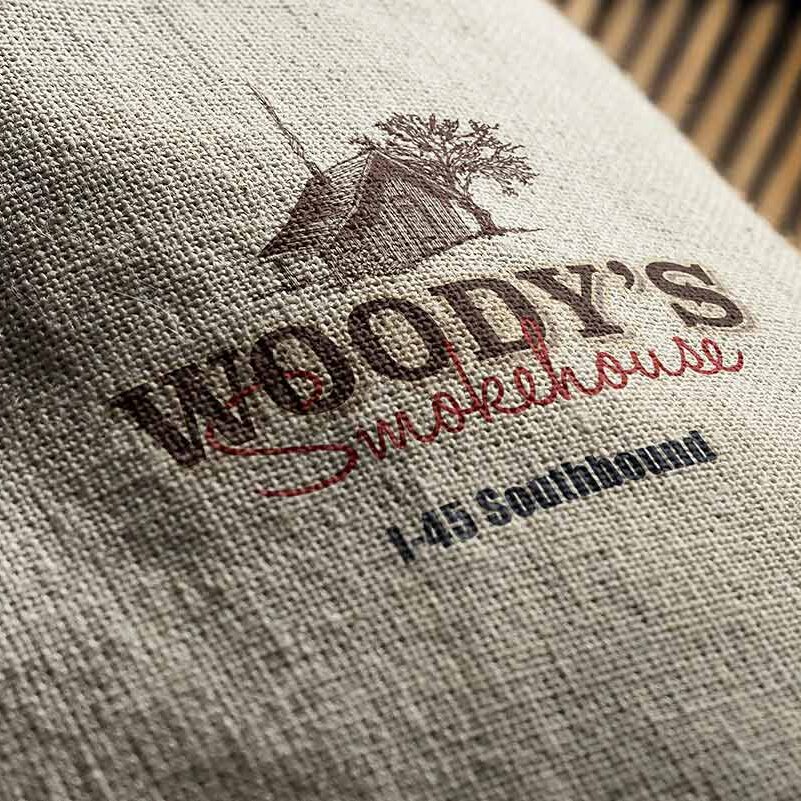 Woody's Smokehouse logo mockup